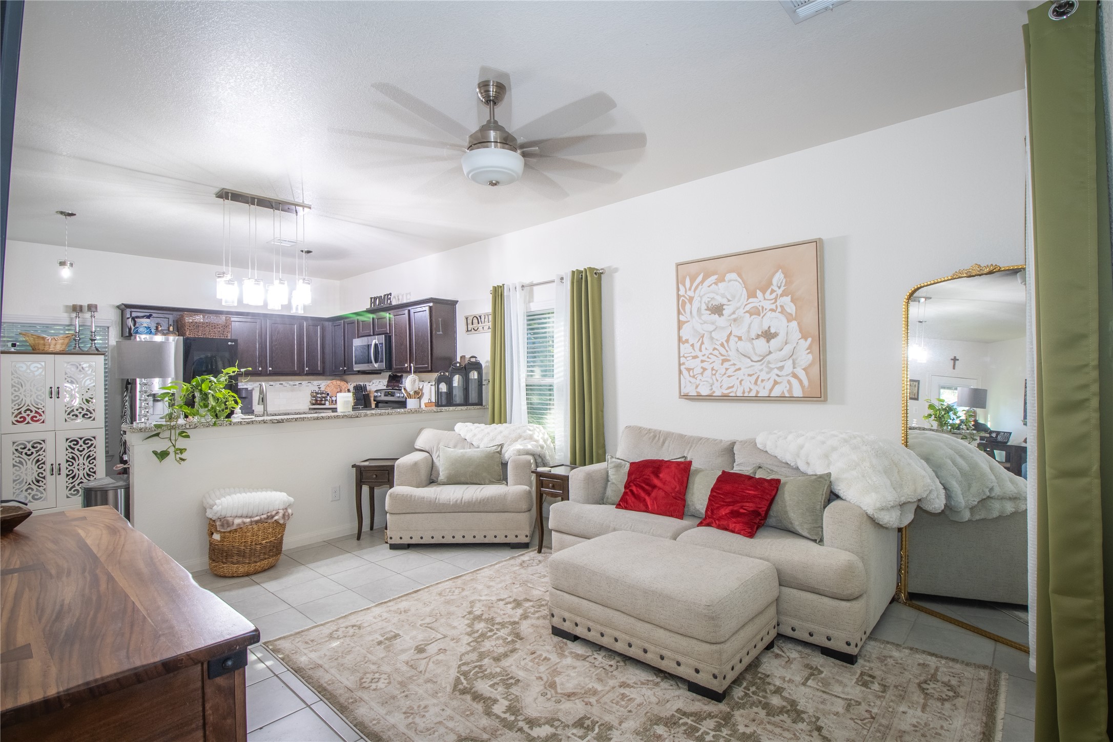 15583 Arrowhead Loop West Willis, TX 77378 - Photo 5 of 21 a living room with furniture and a large window