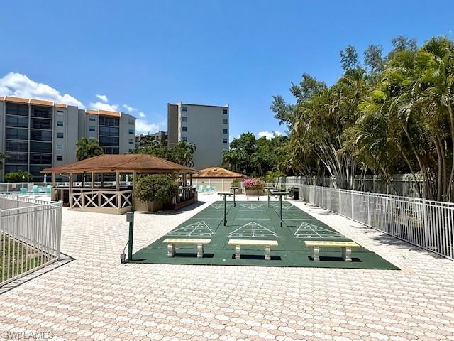 3910 Inverrary Boulevard, Unit 407B Lauderhill, FL 33319 - Photo 21 of 28 a view of a swimming pool with a patio