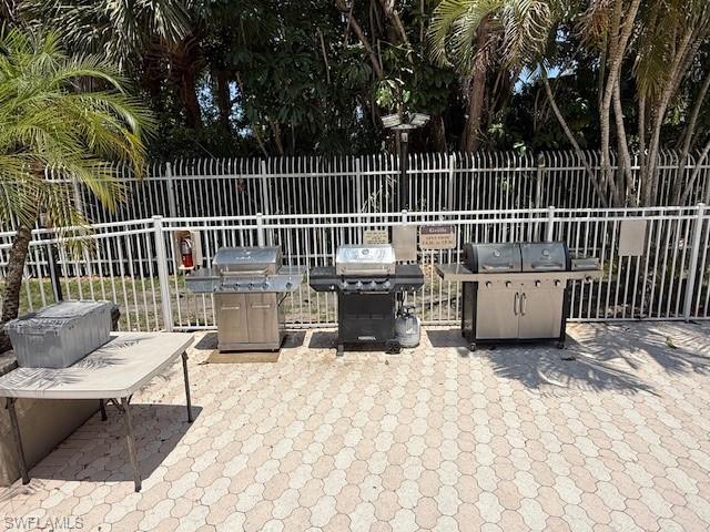 3910 Inverrary Boulevard, Unit 407B Lauderhill, FL 33319 - Photo 22 of 28 a view of a chair and tables