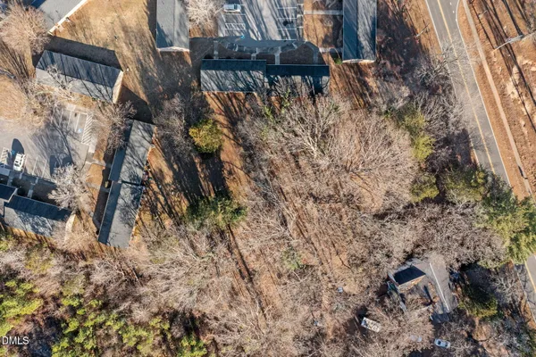 a view of a backyard of the house