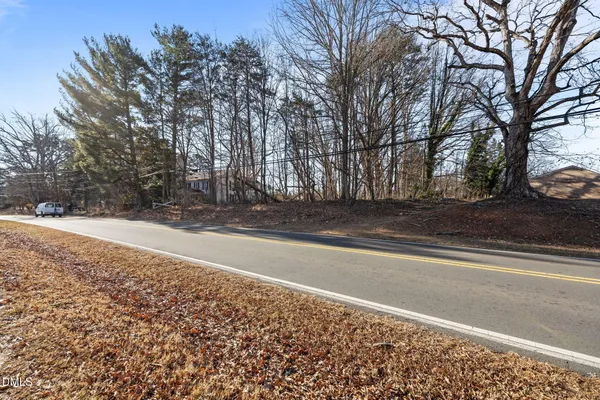 a view of a yard with a trees