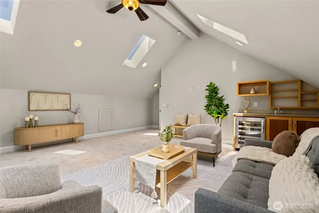 a spacious bedroom with a bed and window