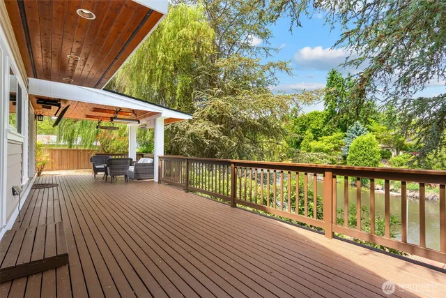 a view of a city from a dining room with furniture window and outside view