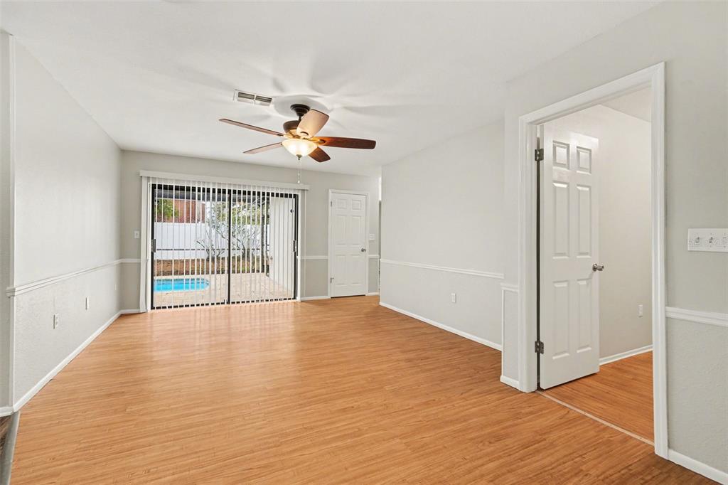 8103 Roxboro Drive Hudson, FL 34667 - Photo 16 of 28 a view of an empty room with a window