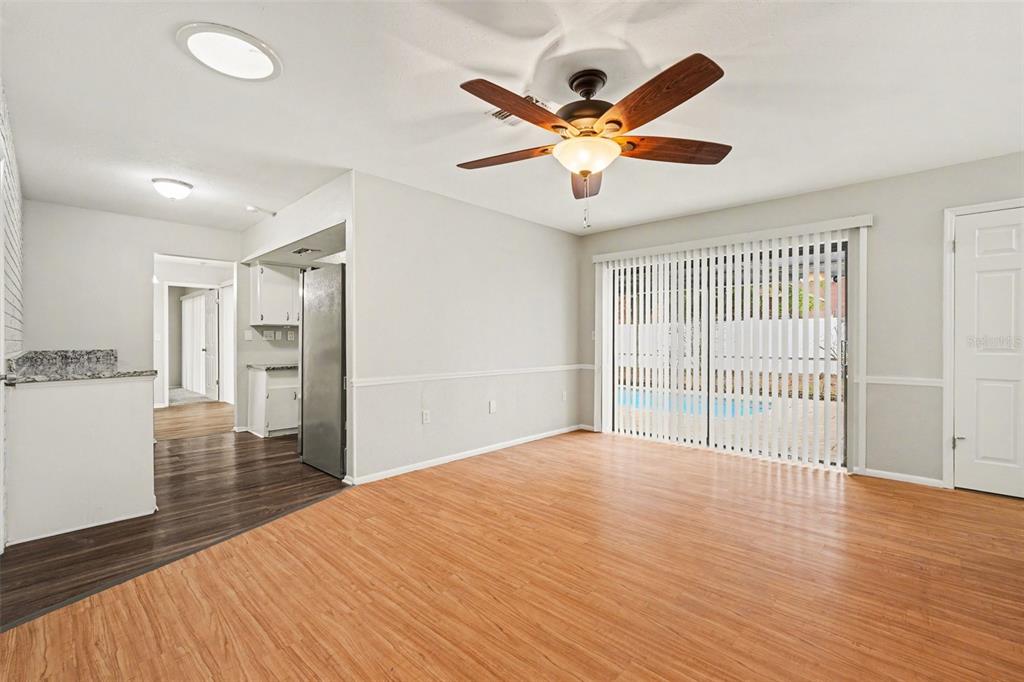 8103 Roxboro Drive Hudson, FL 34667 - Photo 17 of 28 a view of a livingroom with a ceiling fan