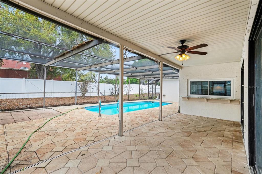 8103 Roxboro Drive Hudson, FL 34667 - Photo 25 of 28 a view of a backyard of a house