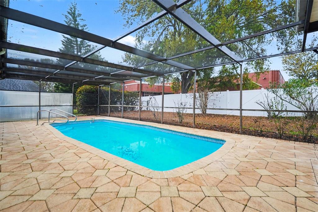 8103 Roxboro Drive Hudson, FL 34667 - Photo 27 of 28 a view of a backyard