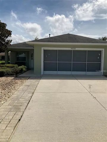 a view of a kitchen with furniture and chandelier