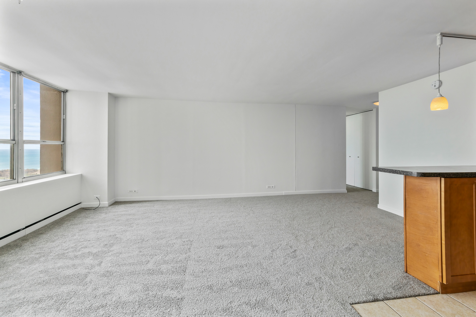 655 West Irving Park Road, Unit 4808 Chicago, IL 60613 - Photo 5 of 26 a view of an empty room with a window