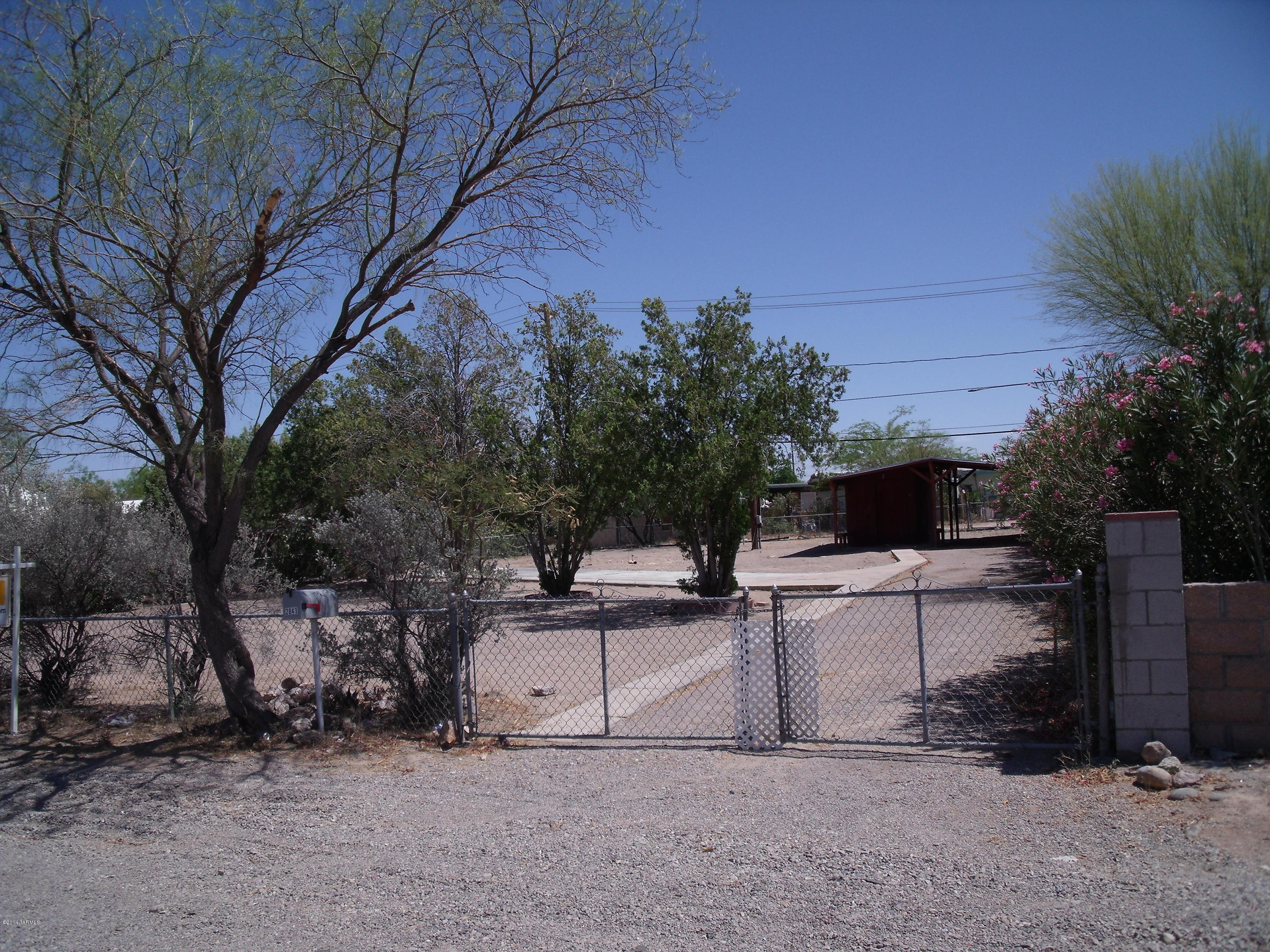 2841 West Quail Road Tucson, AZ 85746 - Photo 1 of 7 View from front of property. Gate to carport.