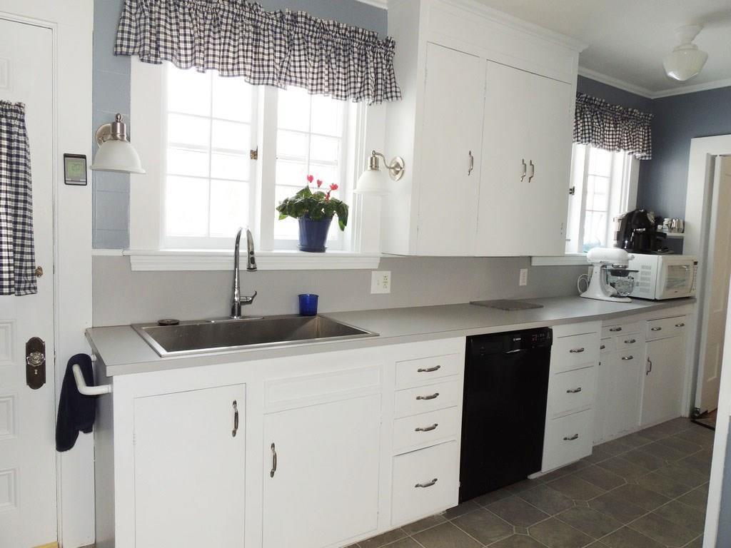 1356 State Street Bangor, ME 04401 - Photo 6 of 35 The kitchen features more cabinet...
