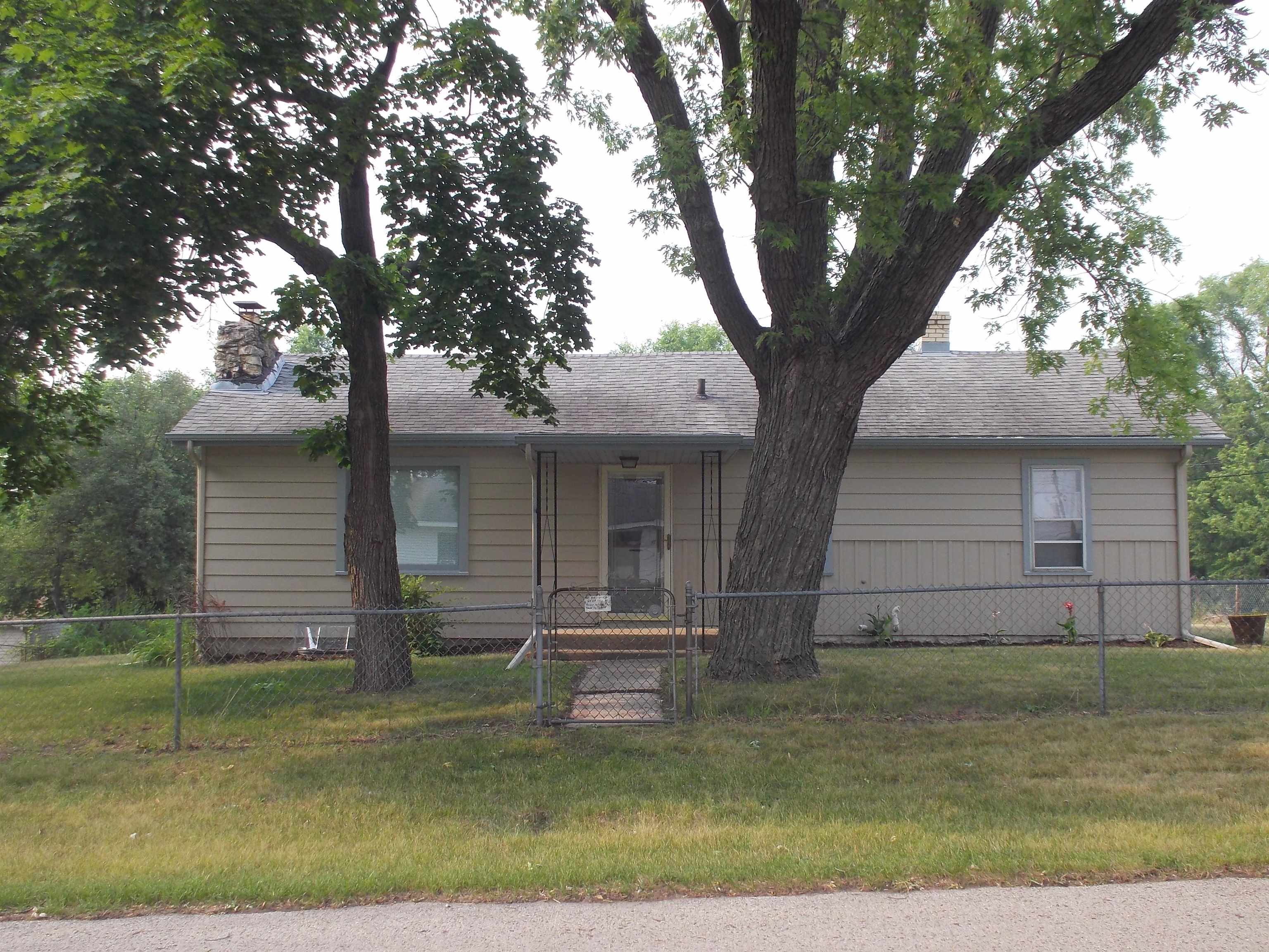724 Taft Road Rockford, IL 61109 - Photo 1 of 19 a front view of a house with a yard