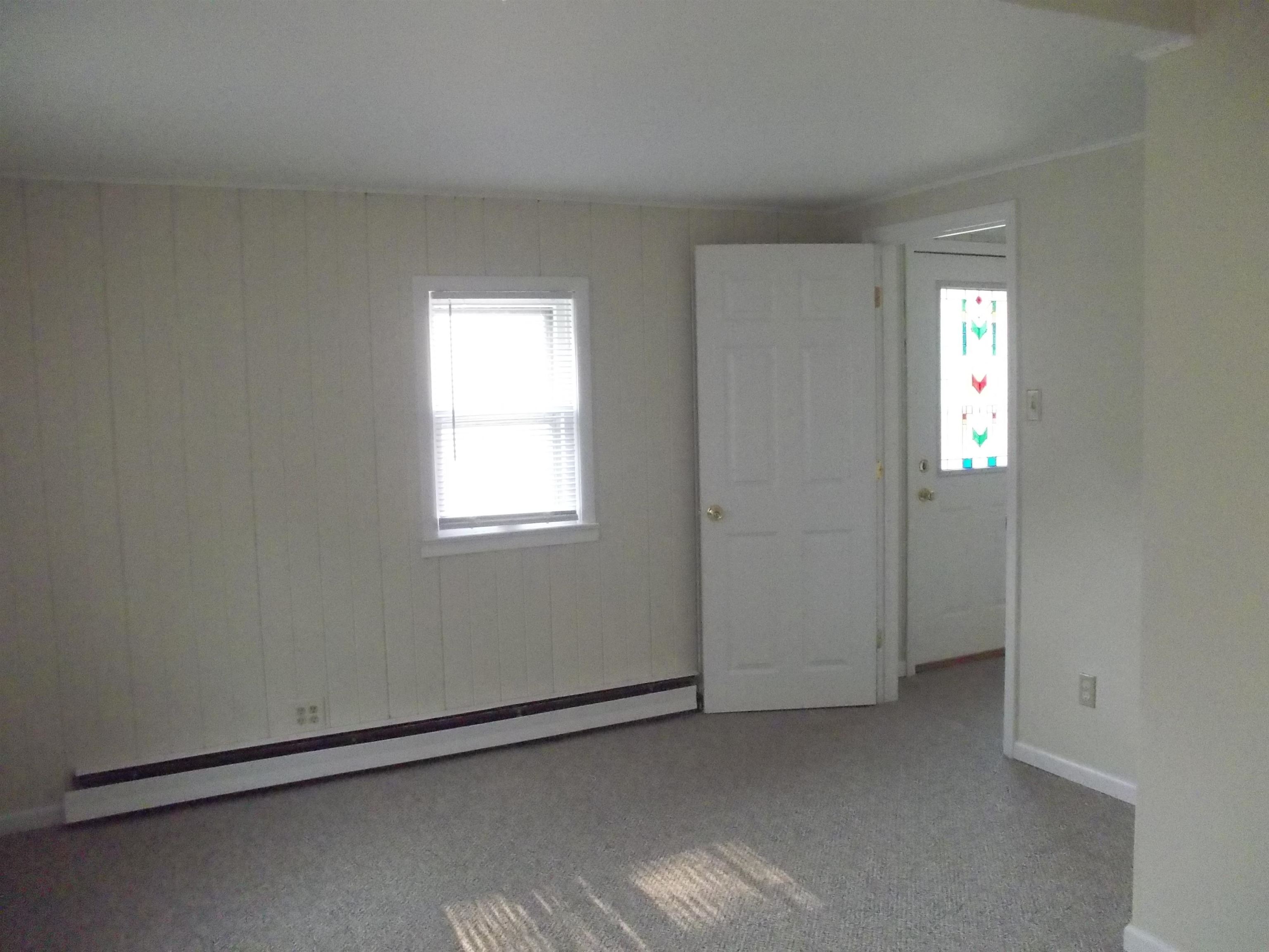 724 Taft Road Rockford, IL 61109 - Photo 14 of 19 an empty room with windows