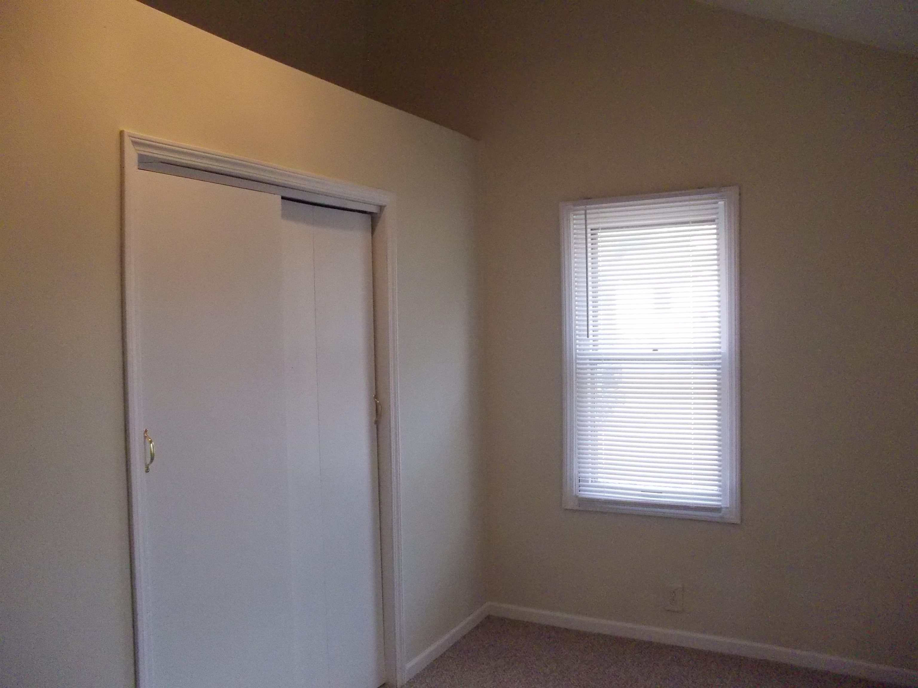 724 Taft Road Rockford, IL 61109 - Photo 15 of 19 a view of an empty room with a window