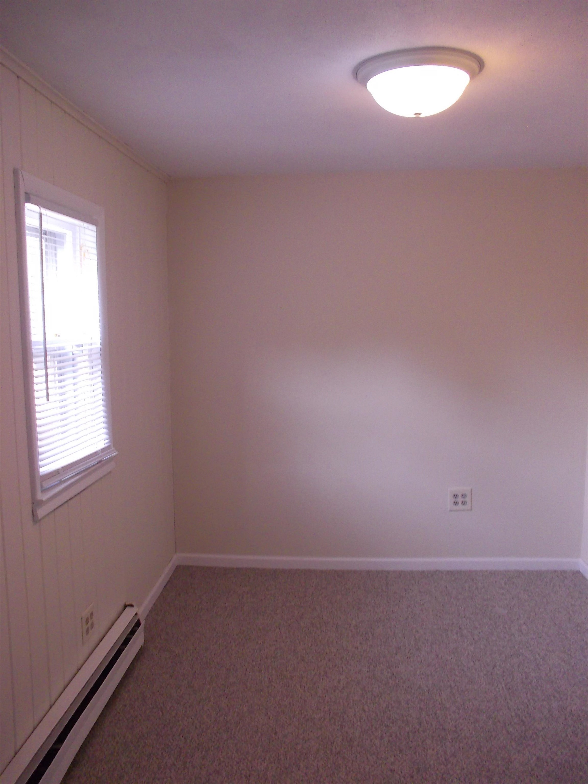 724 Taft Road Rockford, IL 61109 - Photo 16 of 19 an empty room that has a window