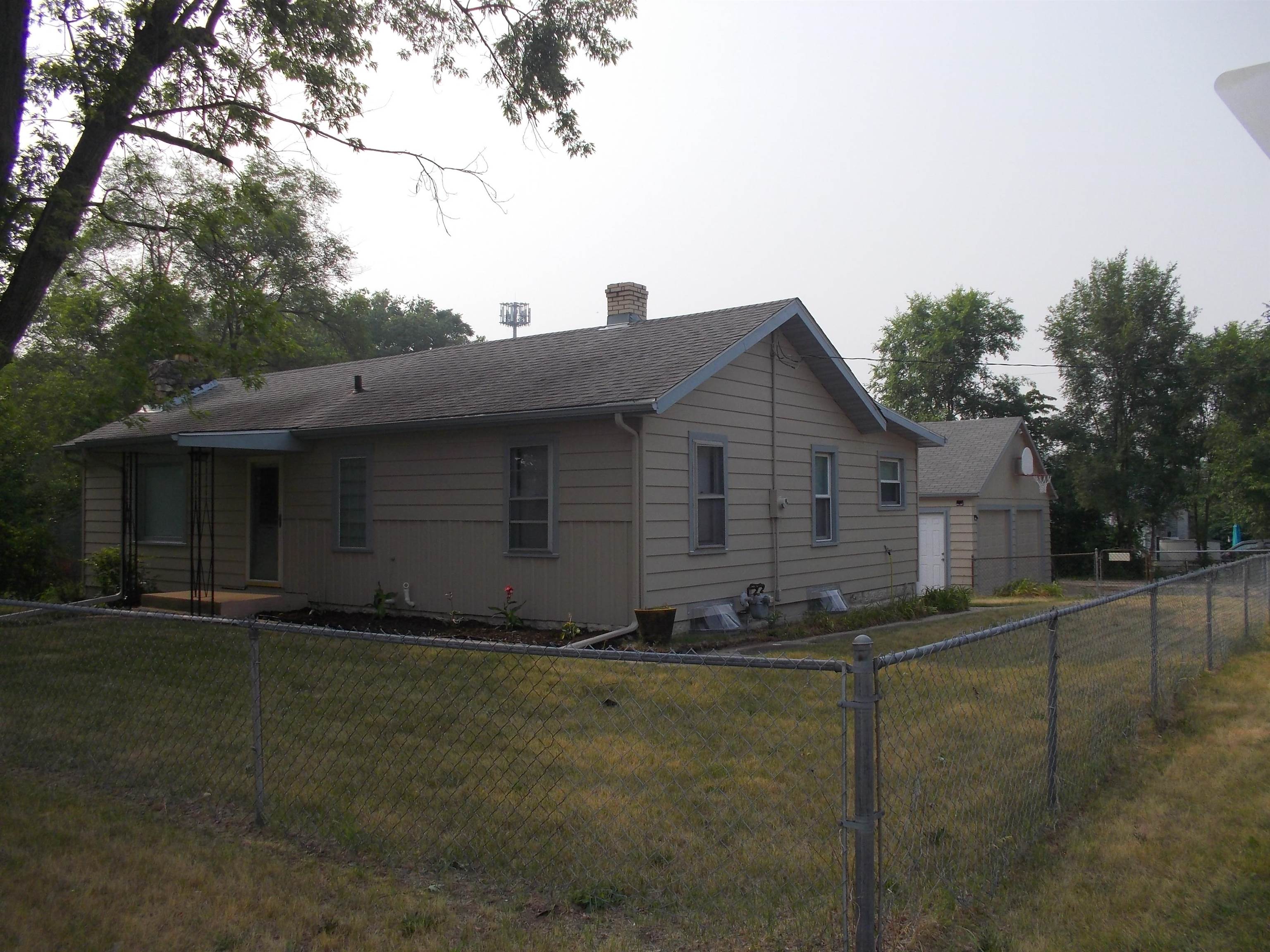 724 Taft Road Rockford, IL 61109 - Photo 3 of 19 a front view of a house with a yard