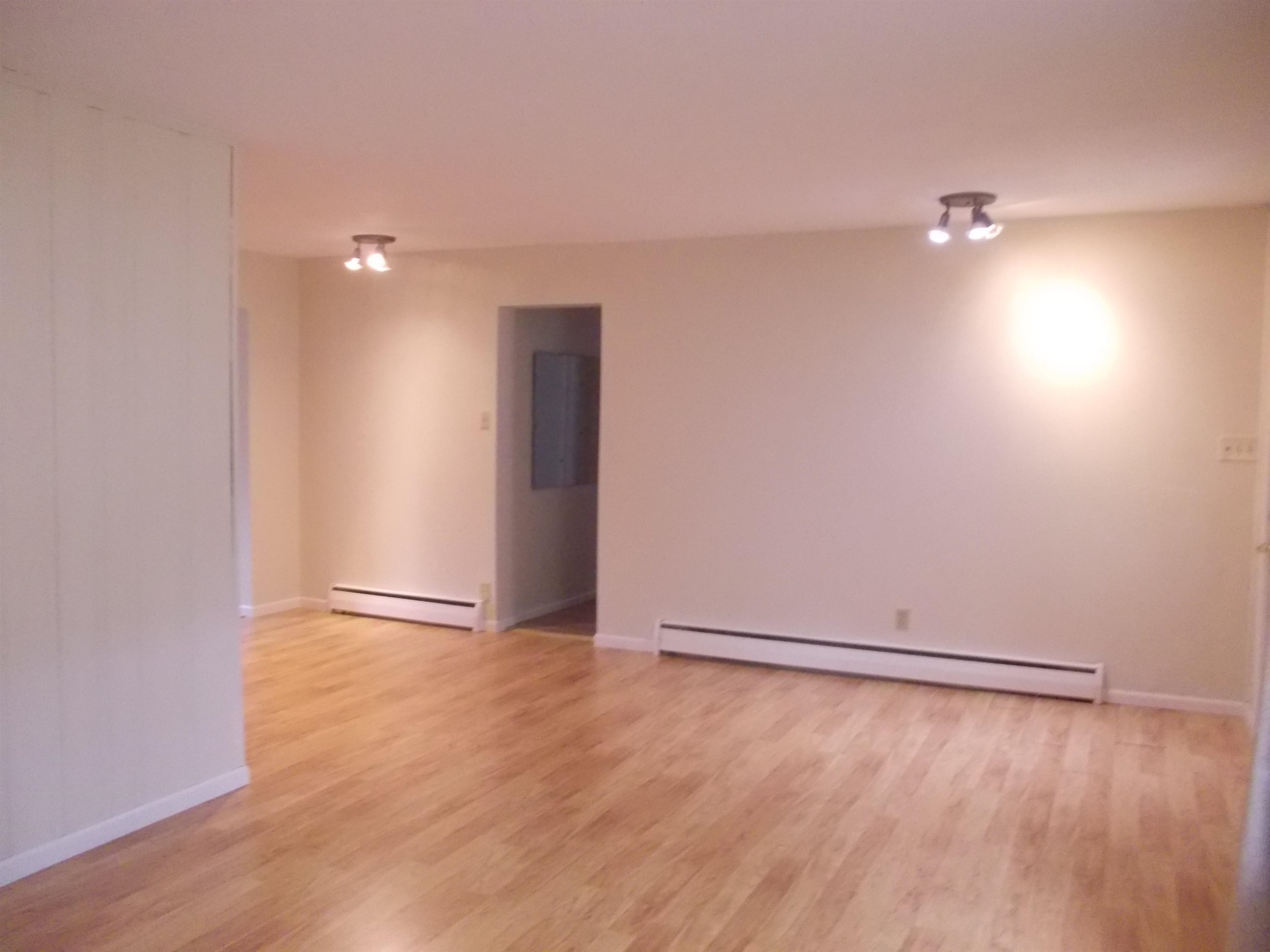 724 Taft Road Rockford, IL 61109 - Photo 9 of 19 wooden floor in an empty room