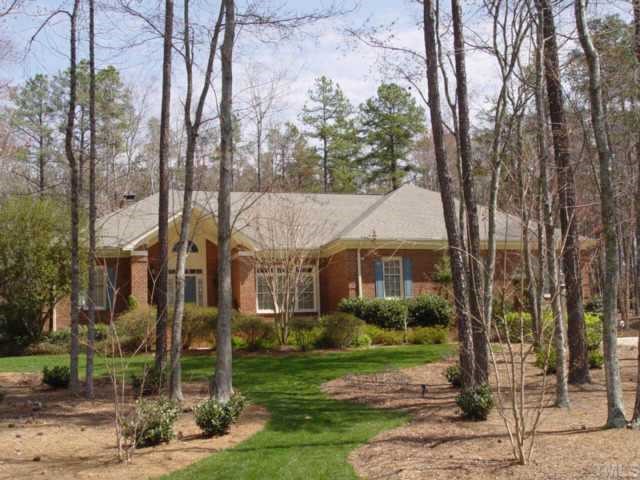 6312 Battleview Drive Raleigh, NC 27613 - Photo 1 of 1 a view of house in front of a yard with potted plants