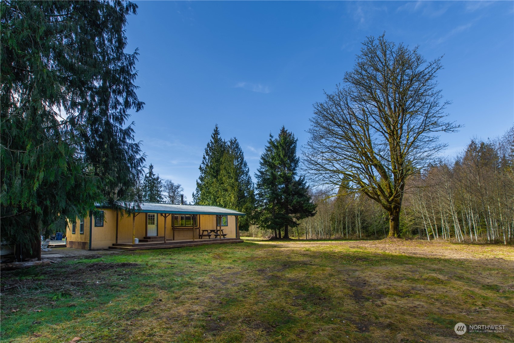 2124 Butler Creek Road Sedro-Woolley, WA 98284 - Photo 27 of 40 a front view of a house with a yard