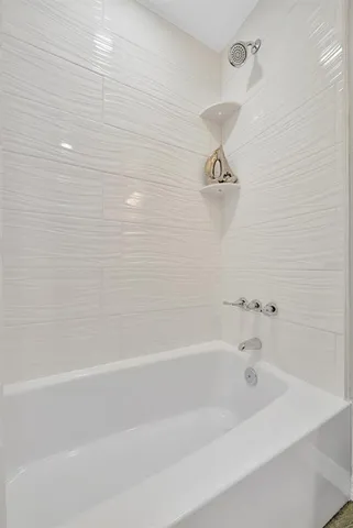 a bathroom with a bathtub