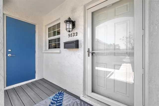a view of livingroom with furniture and floor to ceiling window