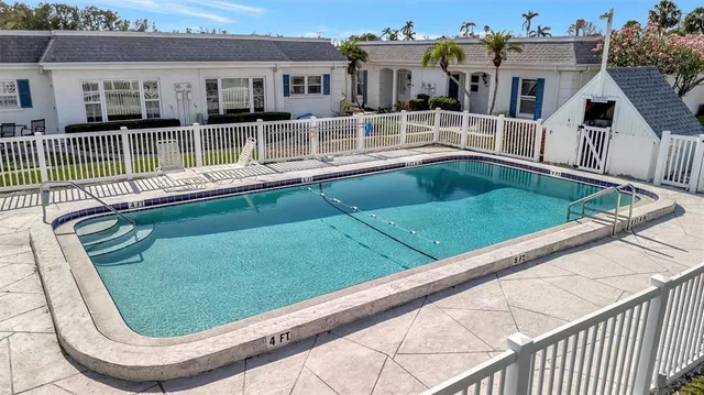 a view of a house with a swimming pool