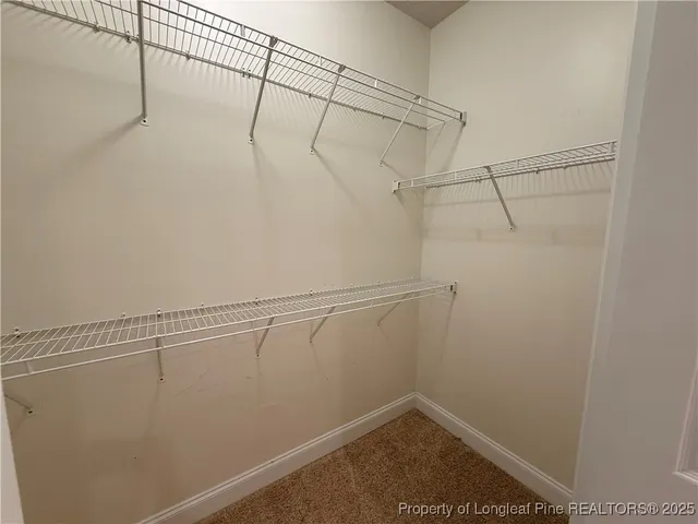 a view of a room with racks on the wall