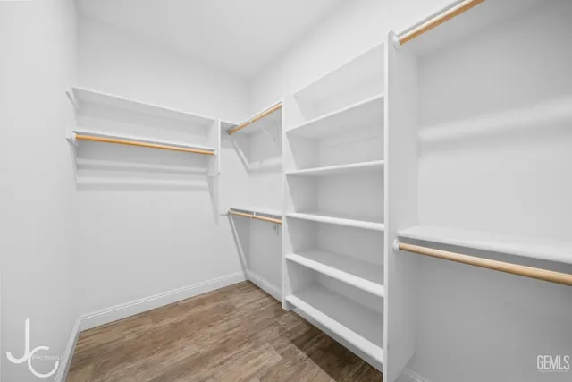 a view of an empty walk in closet
