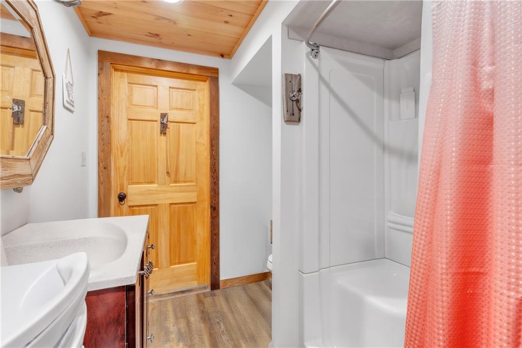 36044 Highway 66 Crown, PA 16233 - Photo 18 of 48 a view of a hallway with wooden floor and staircase