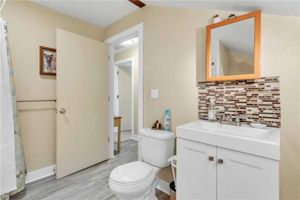 36044 Highway 66 Crown, PA 16233 - Photo 30 of 48 a bathroom with a sink a toilet and shower