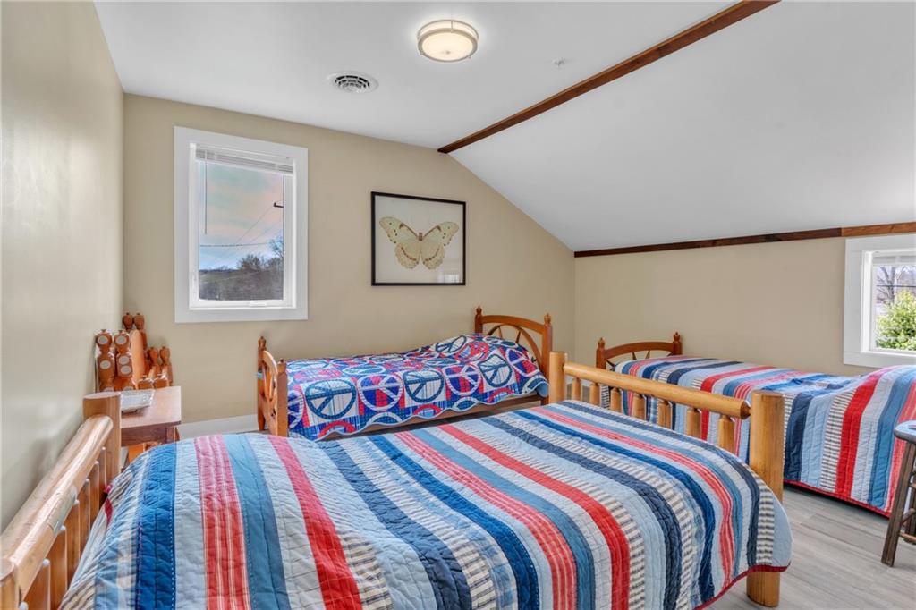 36044 Highway 66 Crown, PA 16233 - Photo 31 of 48 a bedroom with two beds and painting on the wall