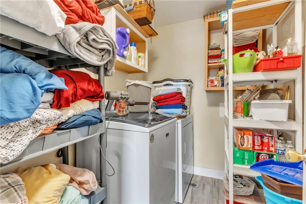 36044 Highway 66 Crown, PA 16233 - Photo 33 of 48 a utility room with stainless steel appliances and cabinets
