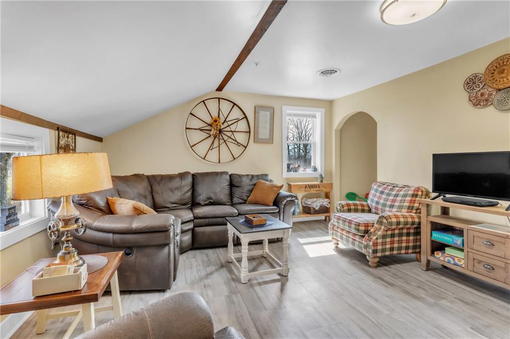 36044 Highway 66 Crown, PA 16233 - Photo 38 of 48 a living room with furniture and a flat screen tv
