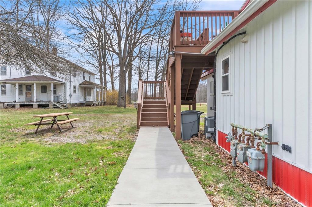 36044 Highway 66 Crown, PA 16233 - Photo 5 of 48 a front view of a house with a yard