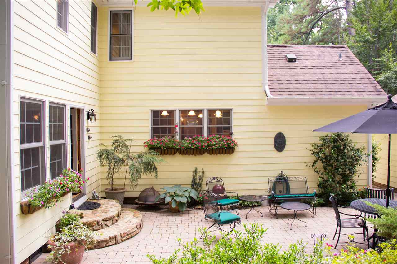 2500 Saddleridge Drive Raleigh, NC 27615 - Photo 10 of 25 This back yard is straight out of a page of Better Homes and Gardens! Huge patio with custom stonework. Plenty of mature trees for privacy. Enjoy hummingbirds, butterflies and even a few, occasional neighborhood deer! Exterior Back