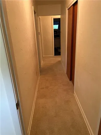an empty room with cabinet