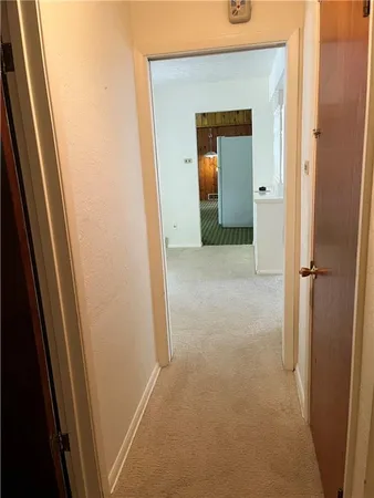 a view of a living room with a flat screen tv