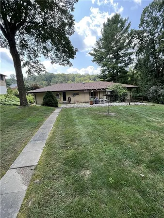 a view of backyard with green space
