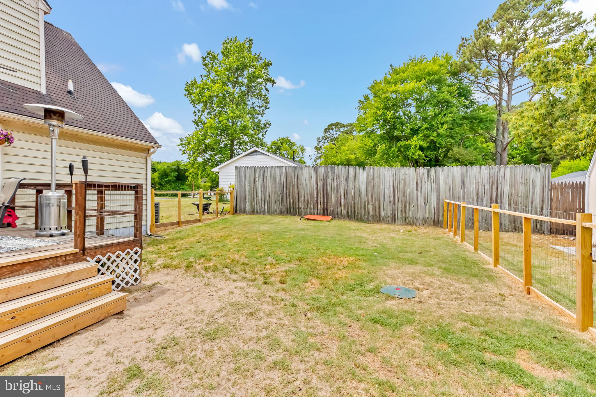 4925 Campground Road Eden, MD 21822 - Photo 40 of 42 a view of backyard with large trees and wooden fence