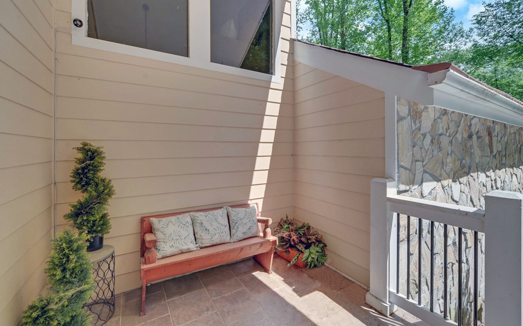 321 Call-Wright Road Ellijay, GA 30540 - Photo 2 of 92 a view of a porch with a bench