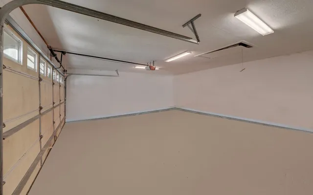 a bedroom with a bed and wooden door