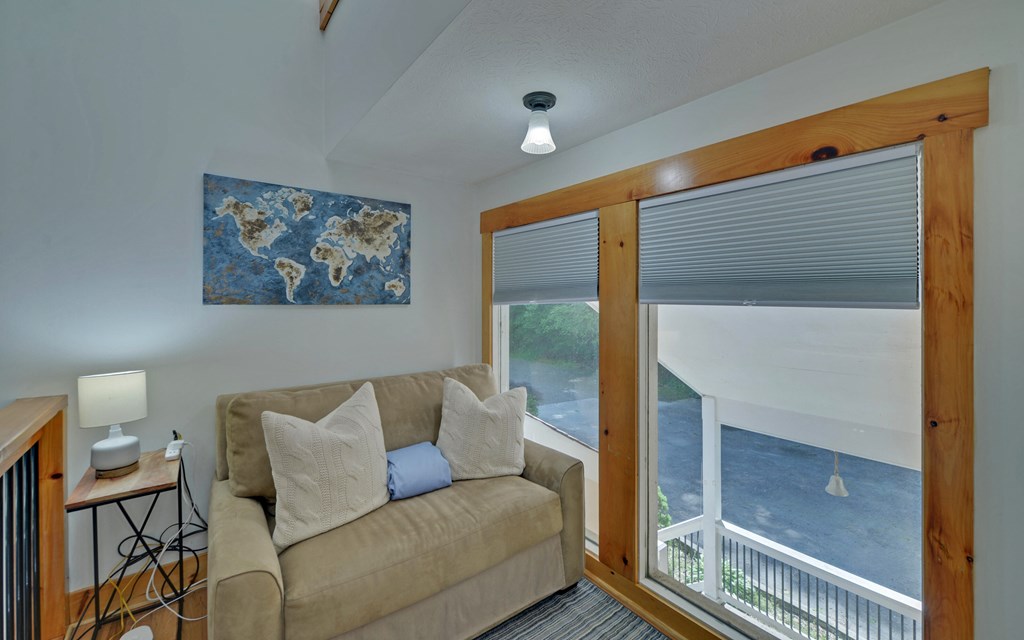 321 Call-Wright Road Ellijay, GA 30540 - Photo 25 of 92 a living room with furniture and a window