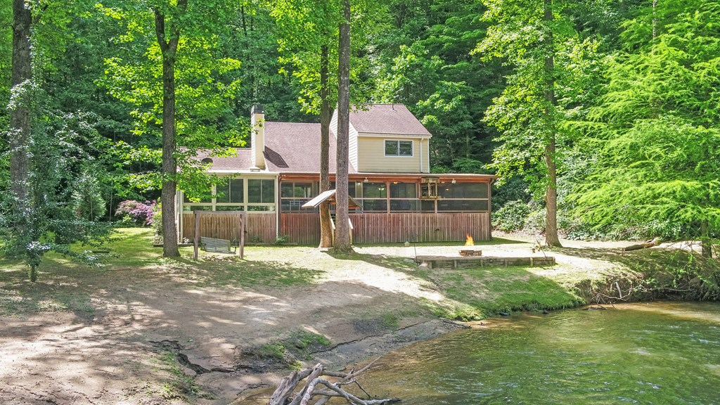 321 Call-Wright Road Ellijay, GA 30540 - Photo 42 of 92 a front view of a house with a yard