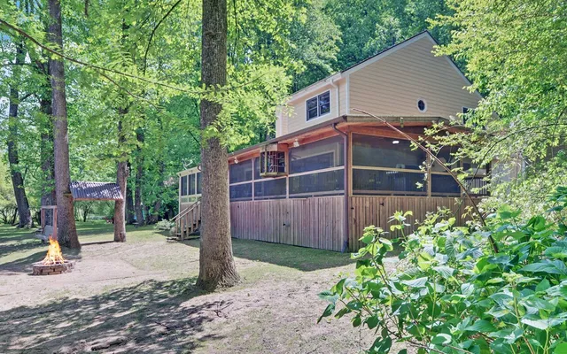 a view of a lake with a yard