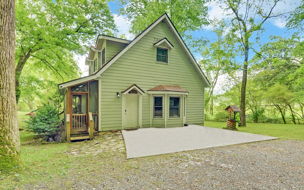 321 Call-Wright Road Ellijay, GA 30540 - Photo 54 of 92 a view of a house with a yard and large tree