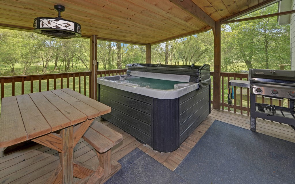321 Call-Wright Road Ellijay, GA 30540 - Photo 73 of 92 a kitchen that has a lot of cabinets and wooden floor
