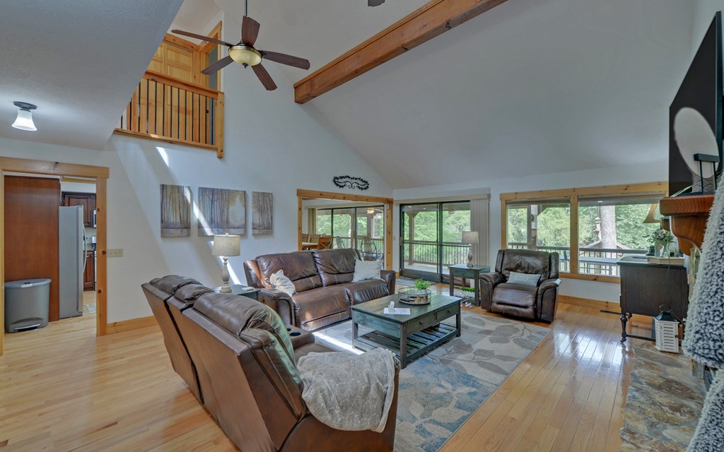 321 Call-Wright Road Ellijay, GA 30540 - Photo 9 of 92 a living room with furniture and a large window