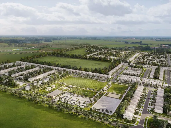 an aerial view of a city with lots of residential buildings