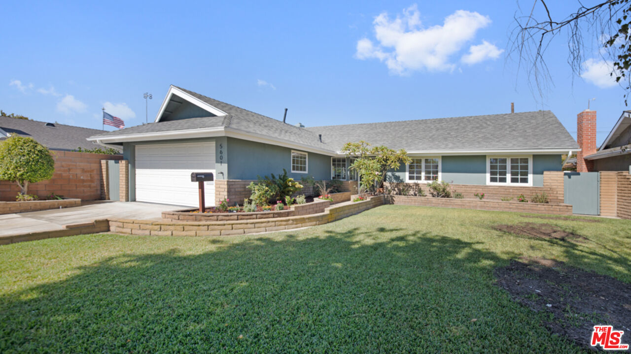 5601 Middlecoff Drive Huntington Beach, CA 92649 - Photo 13 of 49 a view of a house with a yard porch and sitting area