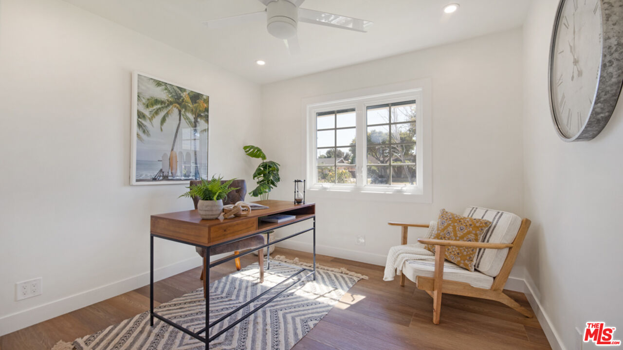 5601 Middlecoff Drive Huntington Beach, CA 92649 - Photo 15 of 49 a living room with furniture and a window